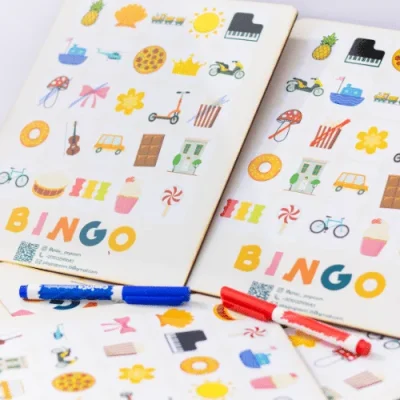 Popcorn Bingo picture cards with blue and red markers